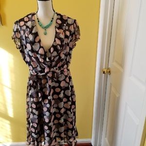 Beautiful dress with sash.